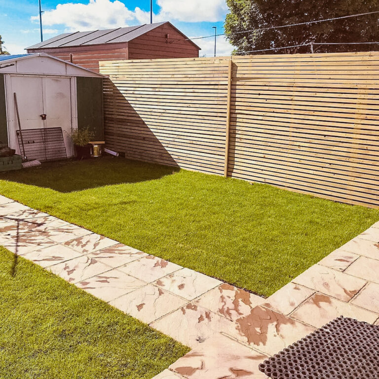 Patio with paving stones through lawn